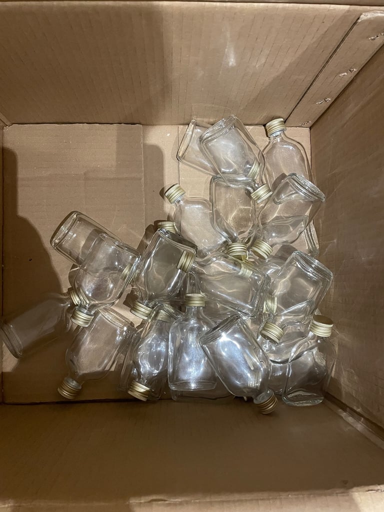 50ml glass bottles with gold caps