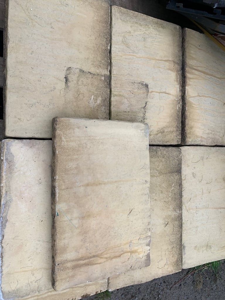 25 buff paving slabs