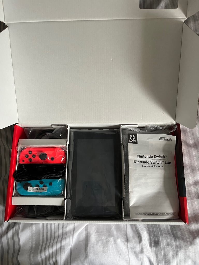 Boxed Switch 1 Neon Red & Blue with Carrier Case