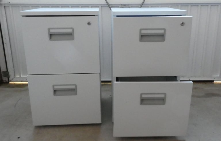 Two A4 size metal filing cabinets