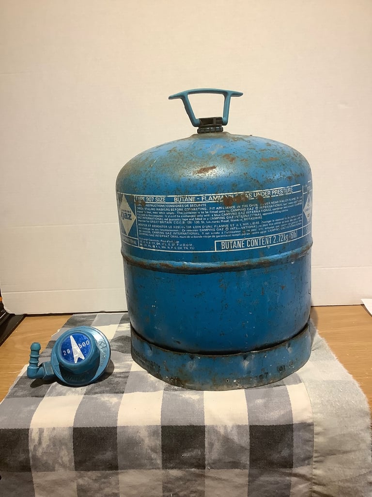 Camping Gaz Type 907 Butane Gas Cylinder part full with Type 28500 Regulator.