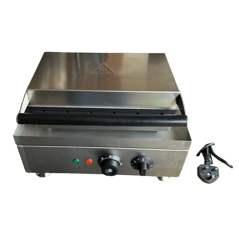 The Electric Lollipop Waffle Machine making lollipop-shaped waffles.