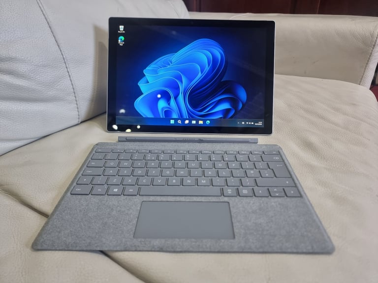 Microsoft Surface Pro 5. i7 7660U, 16GB RAM, 1TB NVME.