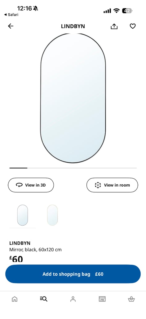 IKEA black bathroom mirror with shelves