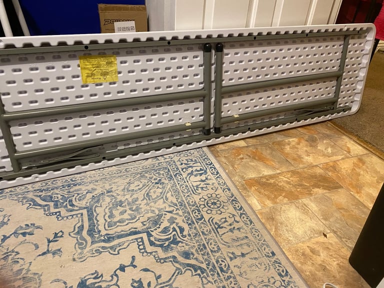 White crafting folding table 6foot long x 18 inches depth x 28 inches high