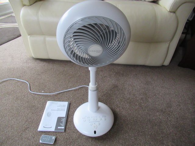 Woozoo floor standing fan, with remote.