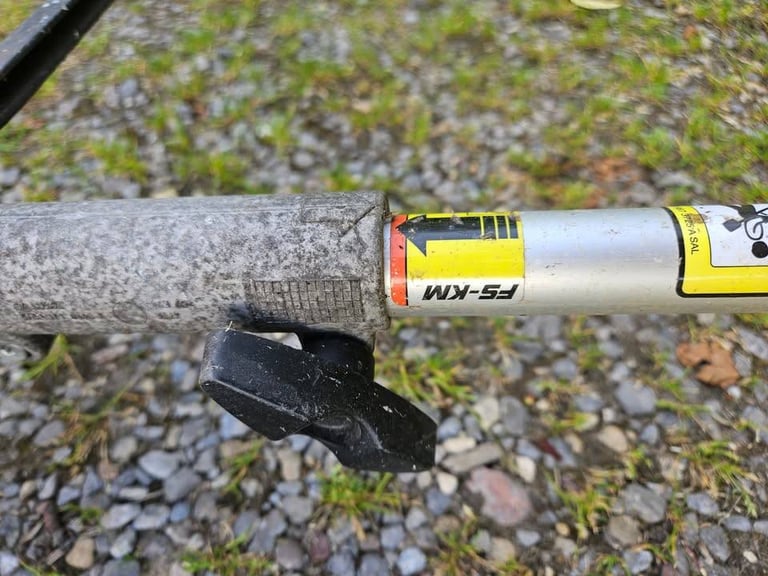 Stihl KM 100 R Combi and Strimmer attachment