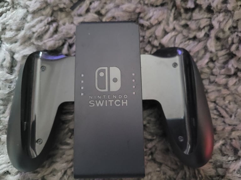 Nintendo Switch oled with accessories and game
