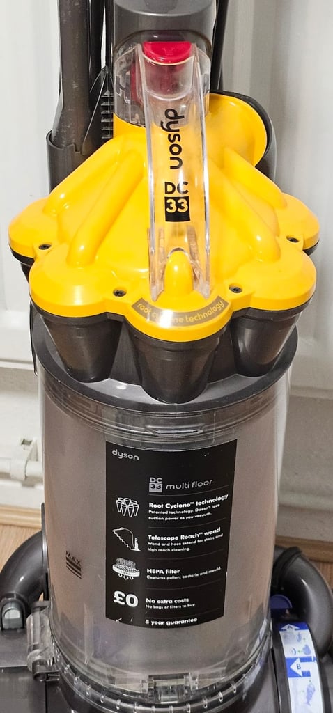 Dyson DC33 upright vacuum cleaner with tools, brand new motor