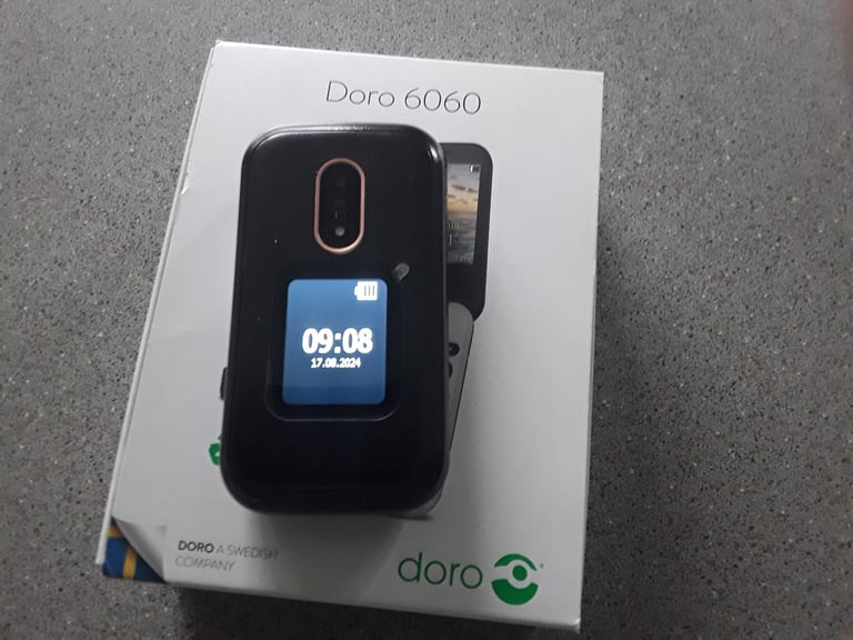 Doro 6060 mobile flip phone as dual screen display as caller I'd open to all networks 