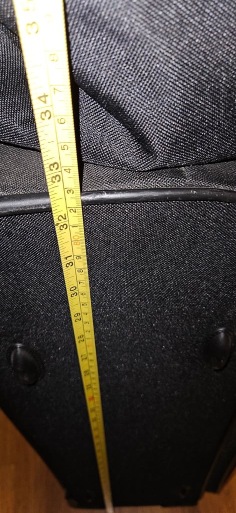 Trip LARGE Suitcase with extra small bag.