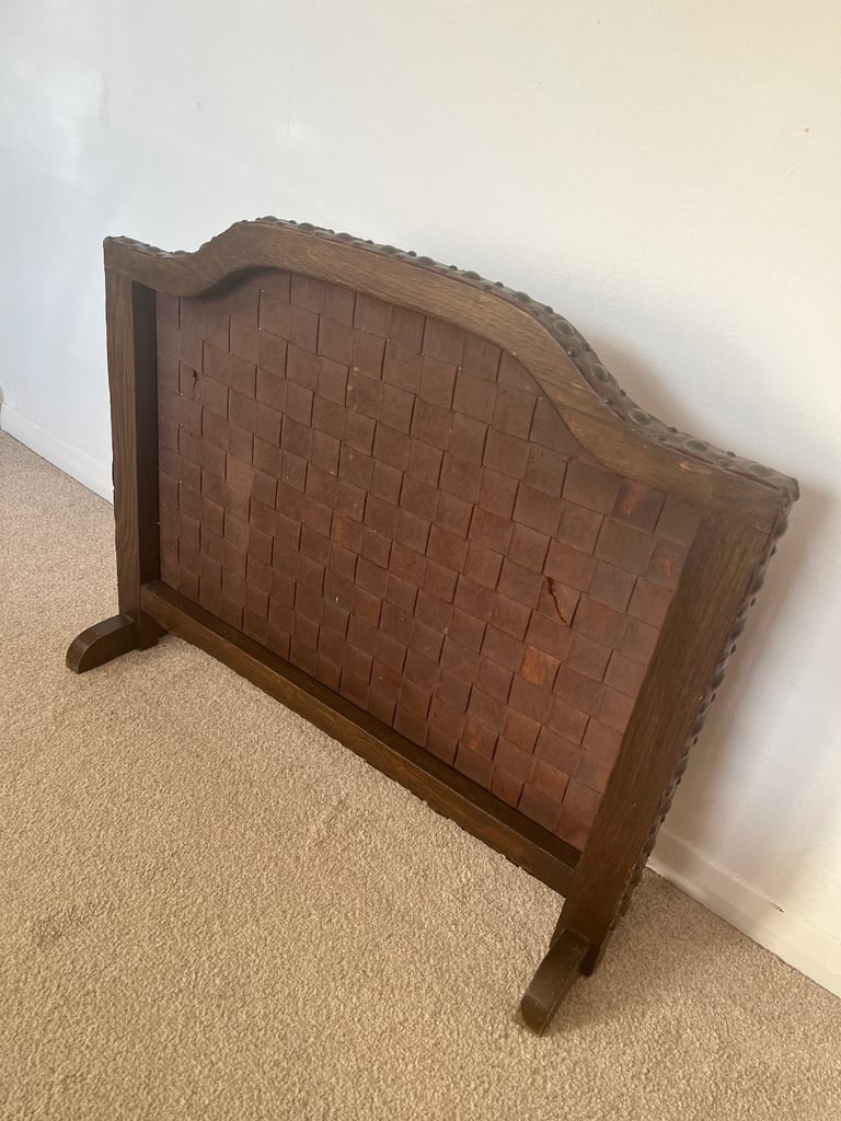 Arts and Crafts Oak and Woven Studded Leather Fire Screen. 