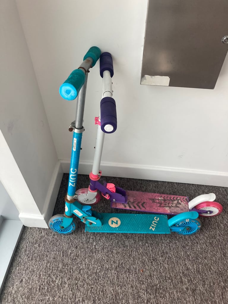 kids bike and two scooters 
