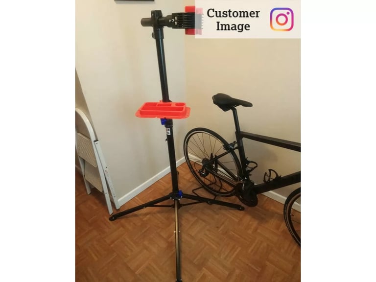 Halfords Bicycle Repair Stand.  Hardly used.  Bargain.  RRP is £45.  Bargain.