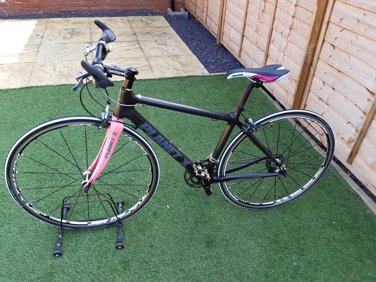 .Ladies Planet X Carbon Fibre Hybrid Road Bike.