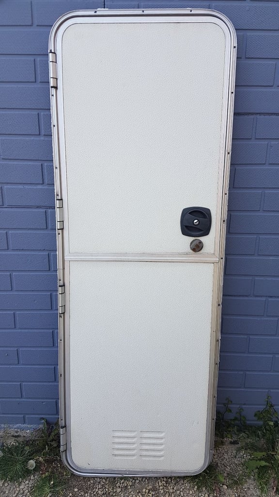 Caravan main doors with frames, with or without windows, blinds locks and keys.