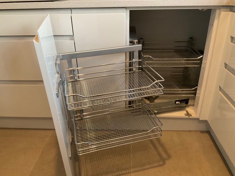 Brand new .Magic corner pull out basket system for Left Hand opening on corner unit.