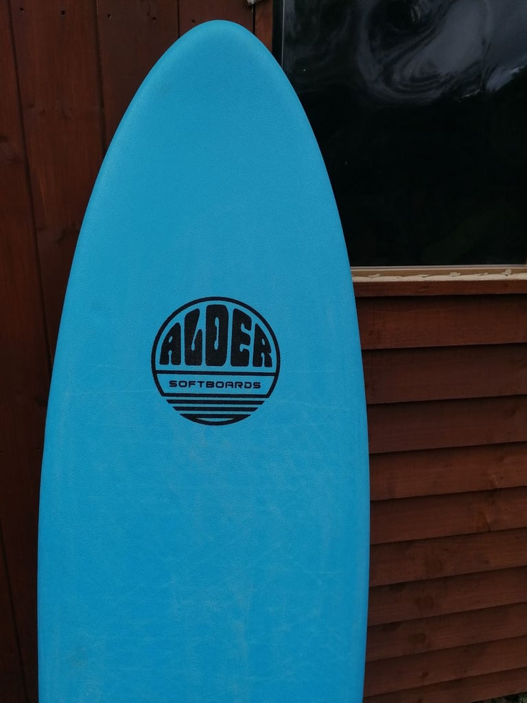 image for Alder surfboard 5 ft 8 and leash and bag