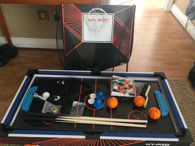 Four in one games table. Snooker,table tennis, air hockey and basketball.