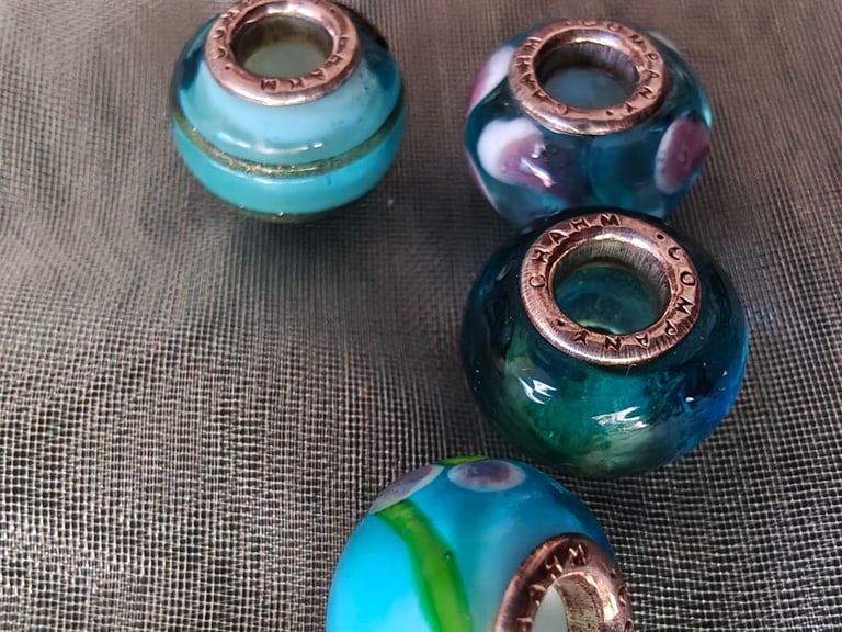 Collection of 5 Teal Glass Charms by Charm Company for bracelet.