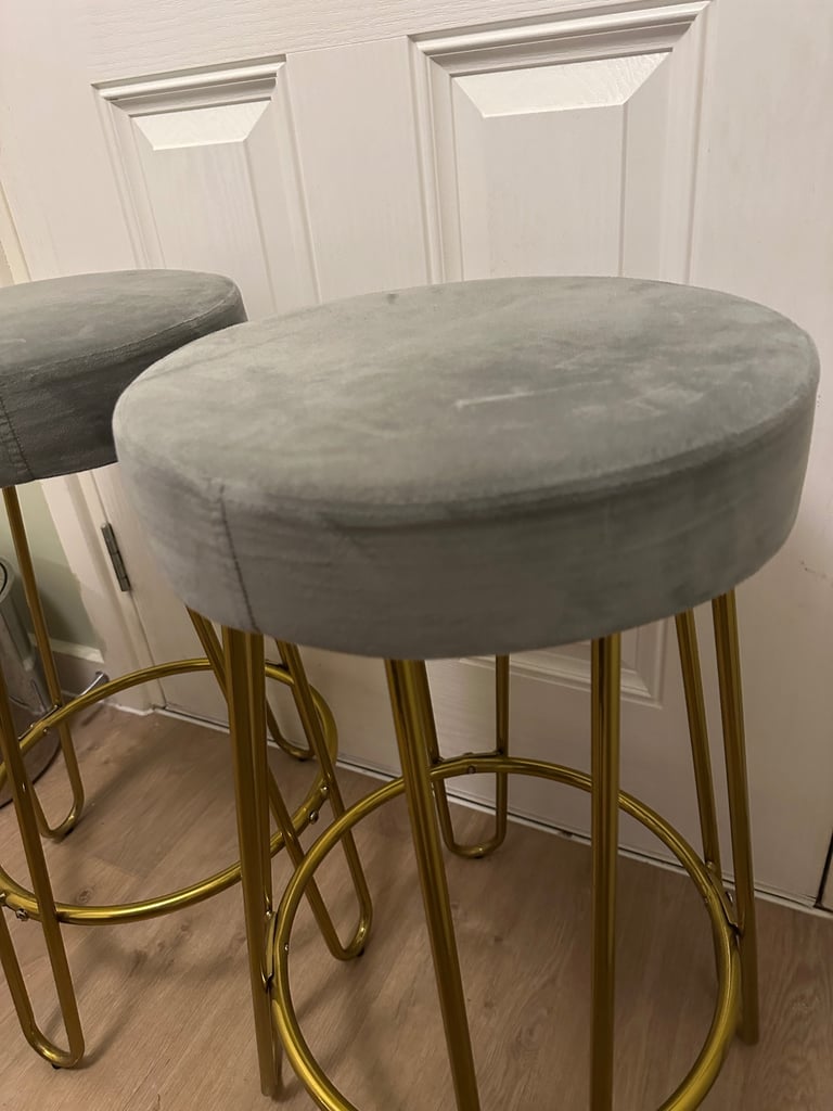 Grey velvet and gold hairpin barstools