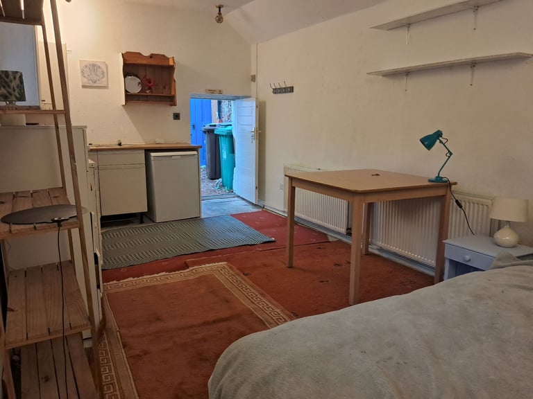 Bright self contained room in family home