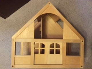 Wooden dolls house with furniture 
