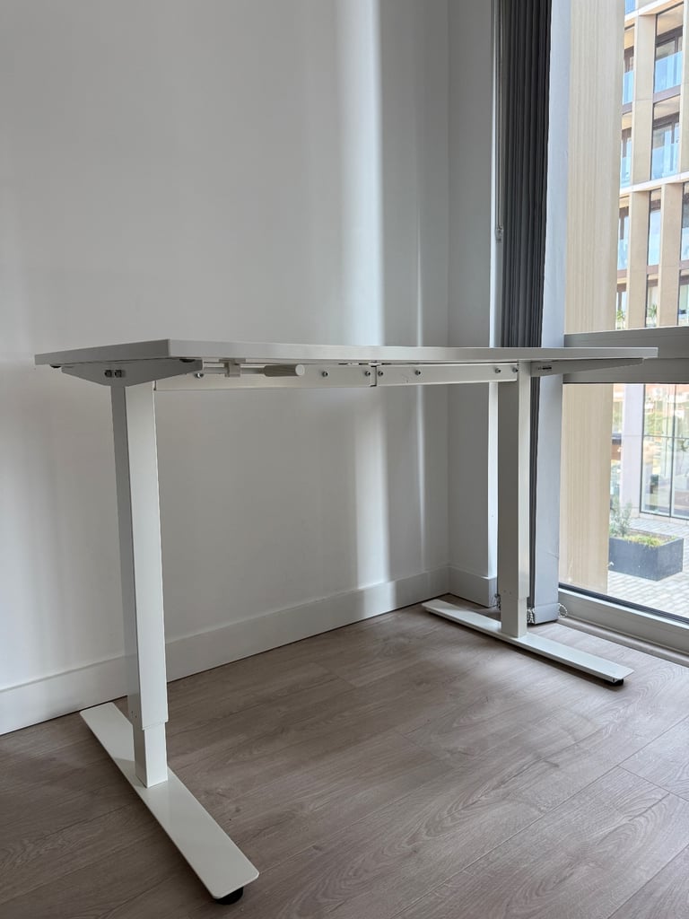 IKEA TROTTEN Sit Stand Office Manual Height Adjustable Desk, White, 120cm x 70cm