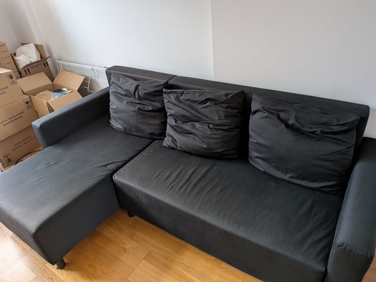 image for IKEA Sofa bed with chaise longue in black.