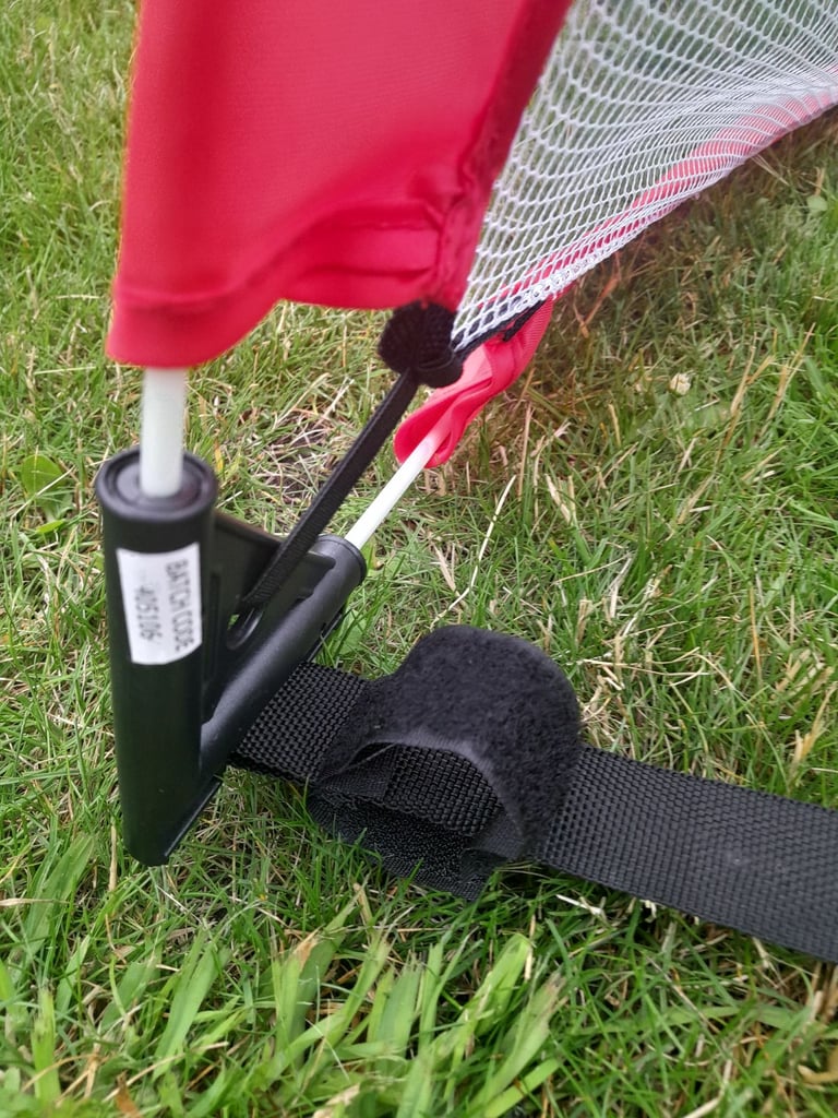 Twin portable pop up football by opti at Argos.  Plus storage bag and box