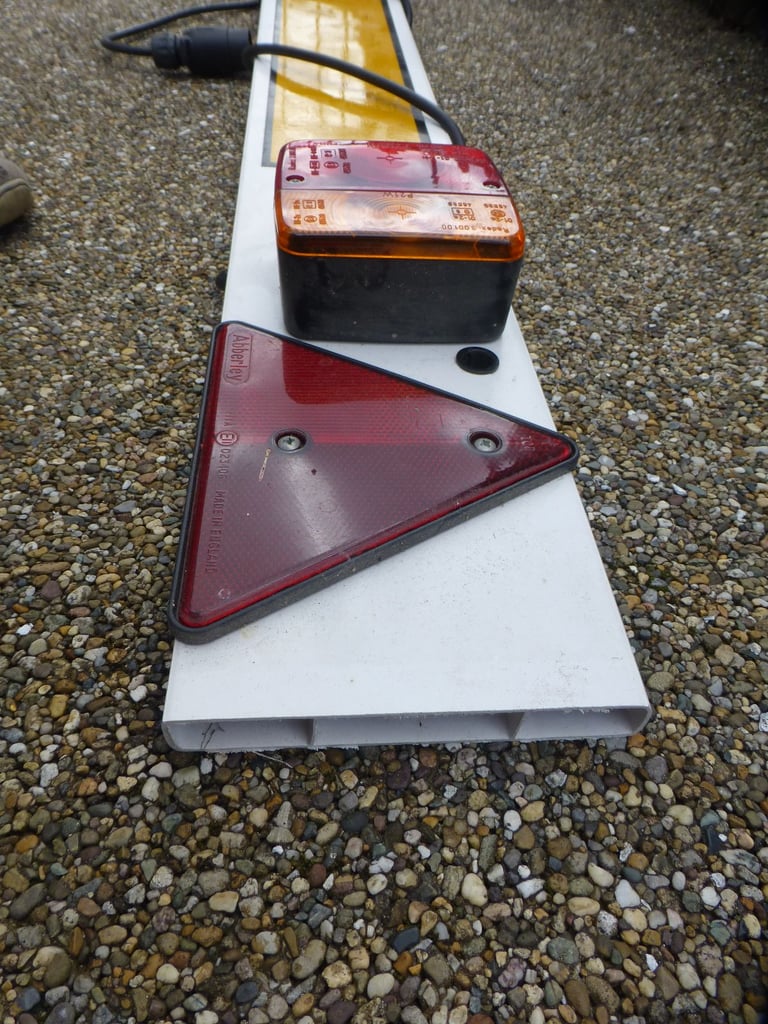 Trailer number plate board and lights
