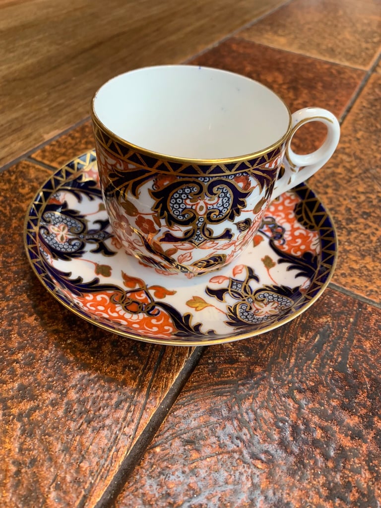 Crown Derby Gilded Cup and Saucer in Imari Colours.