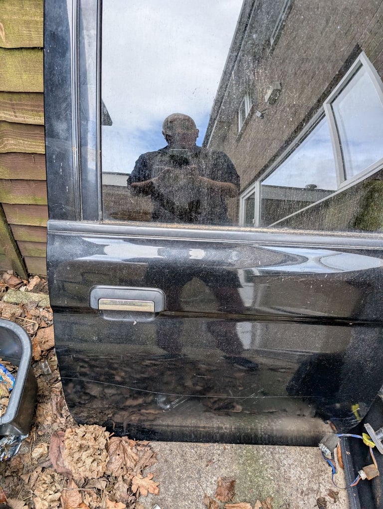 Mitsubishi L200 K74 06 black drivers side back door 