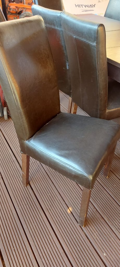 Large table and 12 brown chairs