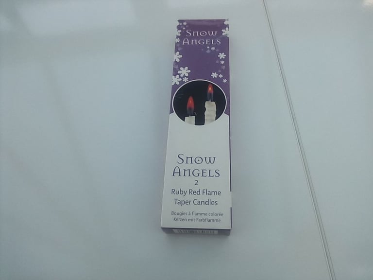 image for Christmas. Brand new pack of two Snow Angels flame taper candles.