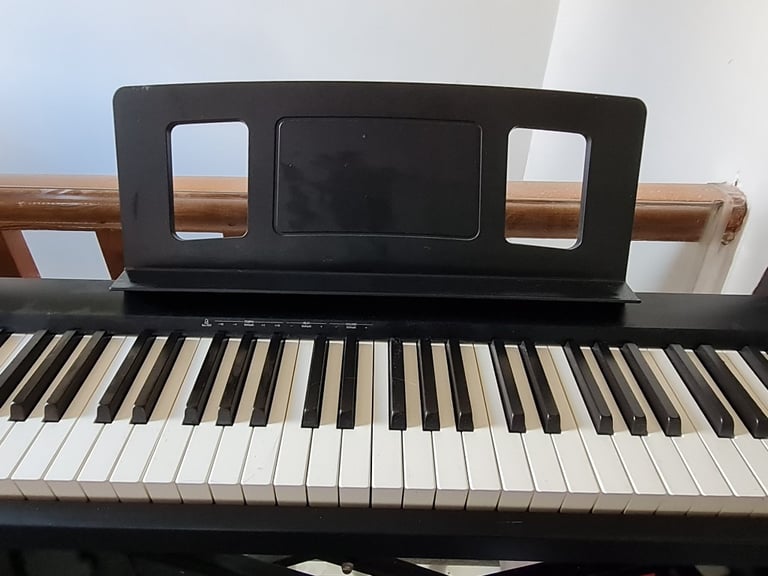 Electric piano - Roland FP10 with stand