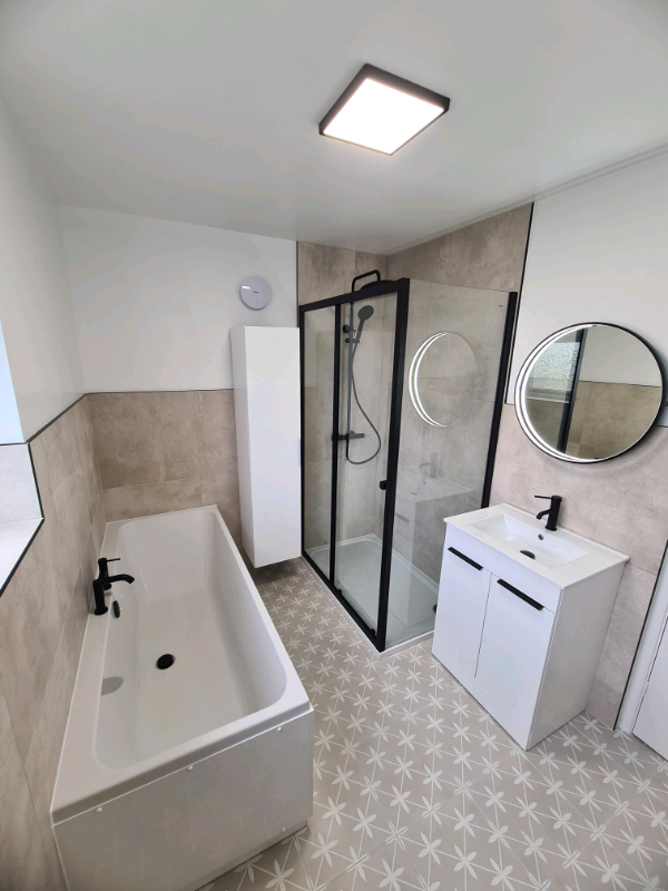 image for TILER.  Bathroom fitting and tiling services 