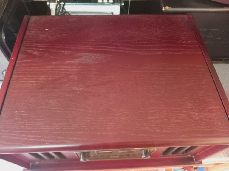 Vintage wooden Audio System. Plays Radio, Record and Cassette. Cd doesnt seem to play. 