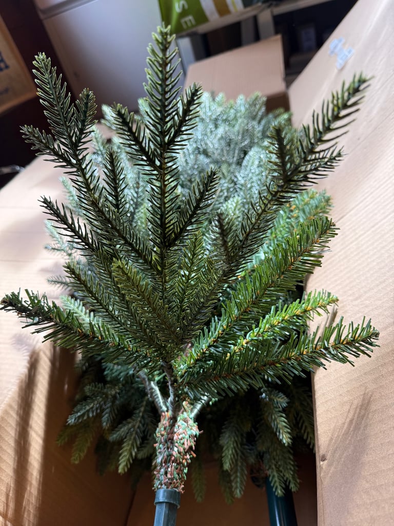 6.5 ft Christmas tree with wicker skirt