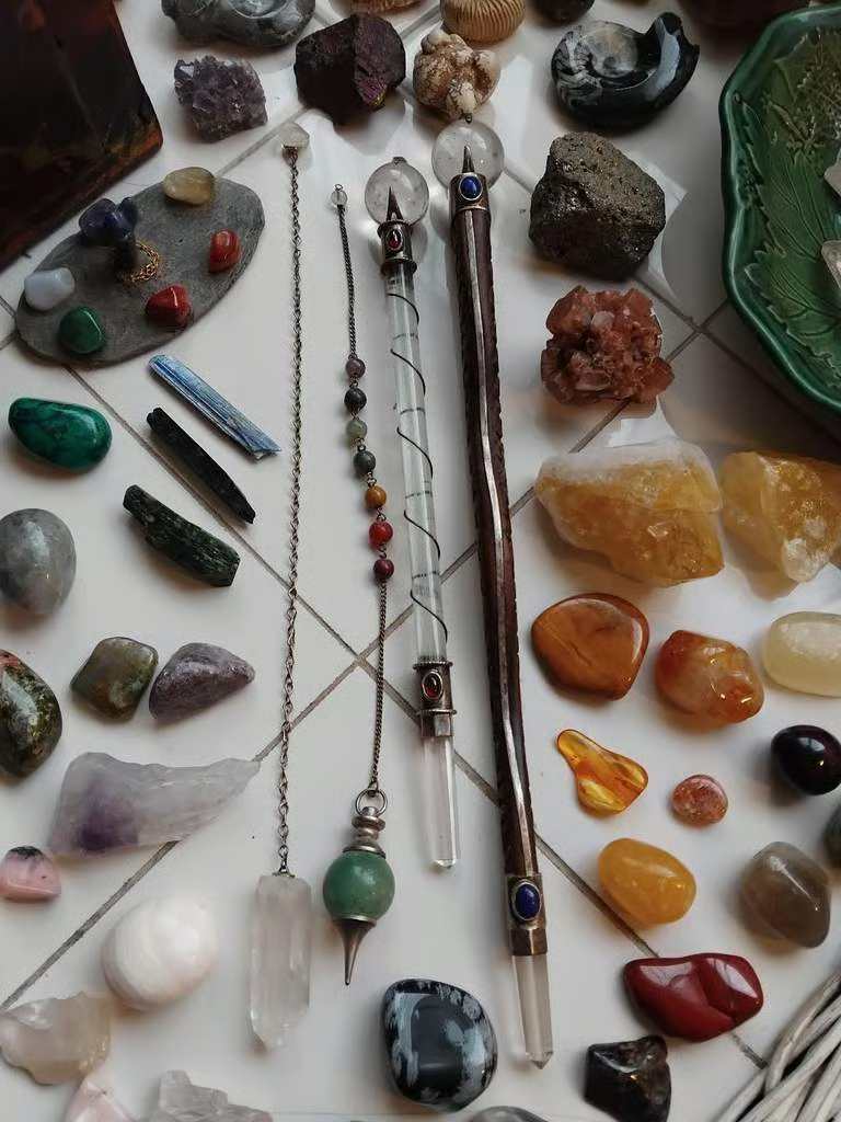 A Large Amount of Crystals, Some Natural, and Tumblestones, 2 Crystal Wands, and 2 Crystal Pendulums