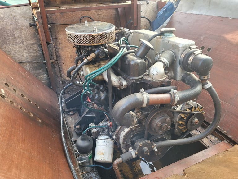 19ft cabin boat, inboard engine and road trailer