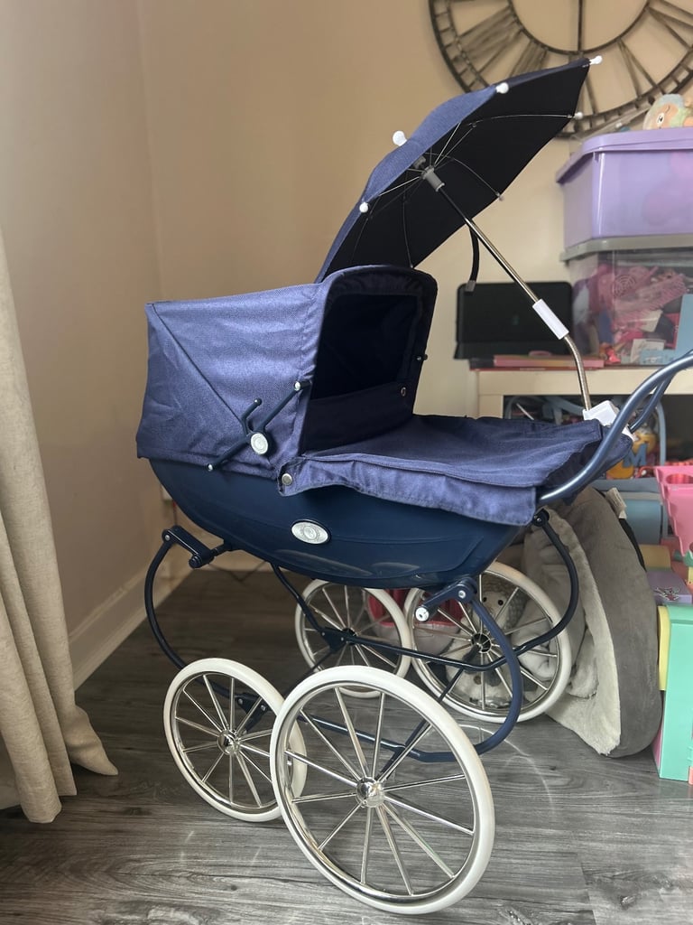Navy dolls pram 