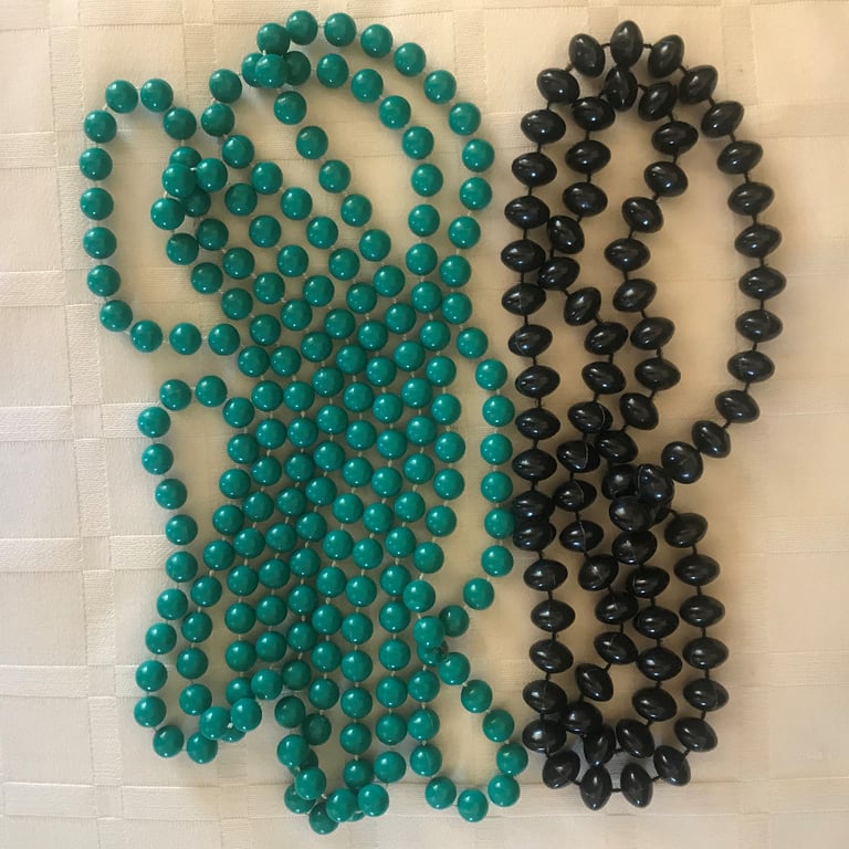 2 bead necklaces: green (approx 64 ins) £3, black (approx 28 ins) £2, both £4 ovno. Can post.