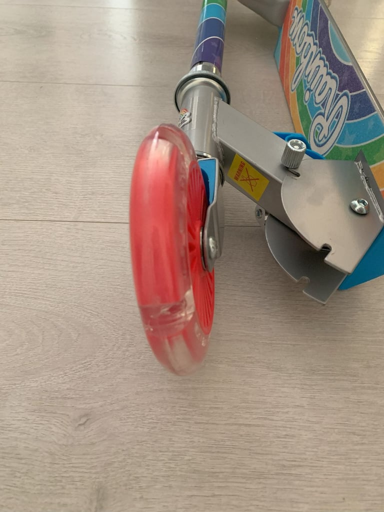 BRAND NEW Rainbow 2-wheel scooter (still in its box)