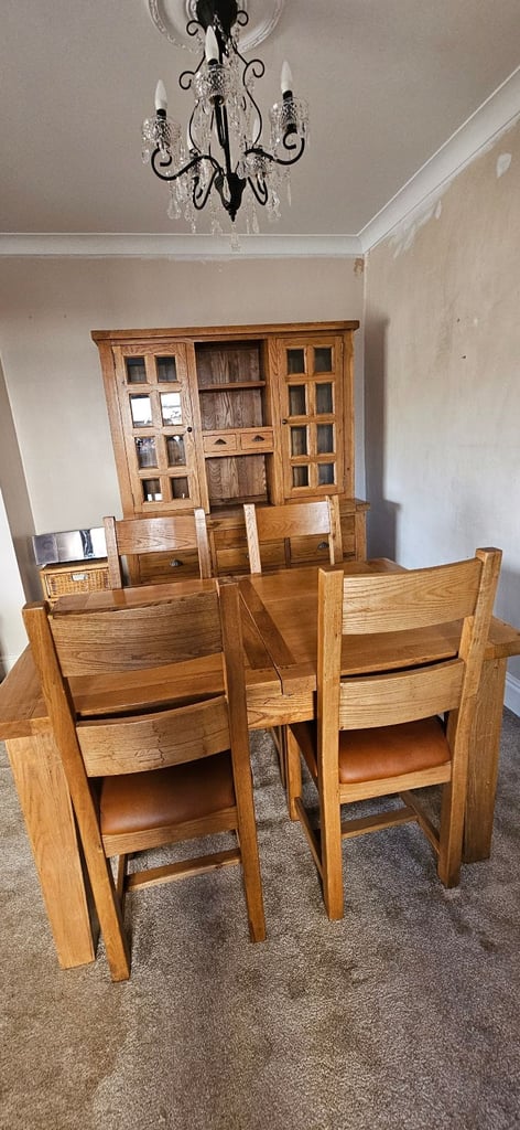 Oak dining table with six chairs and oak dresser