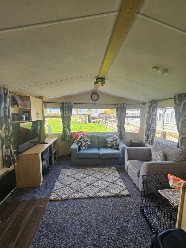 Static caravan with timber structure