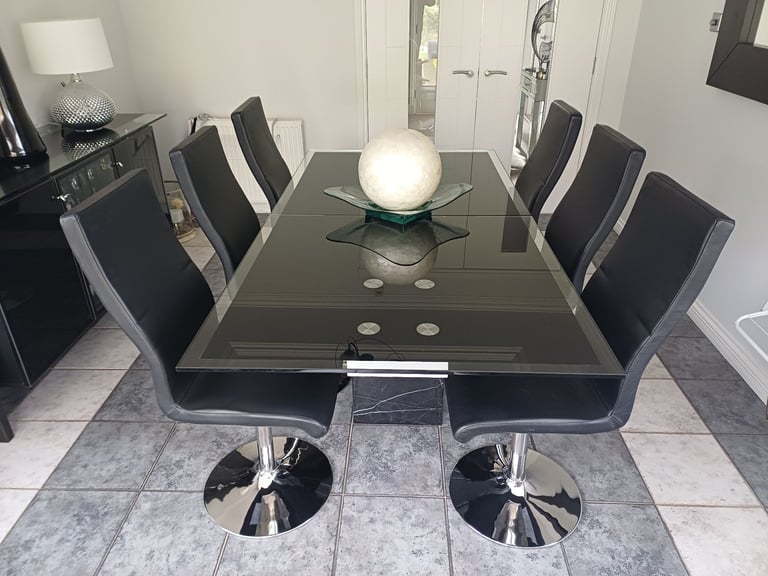Dining room table chairs and display sideboard