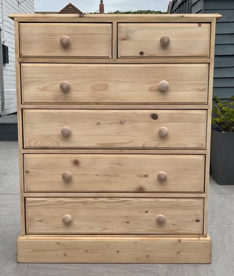 A LARGE OREGON SOLID PINE TALLBOY CHEST OF DRAWERS