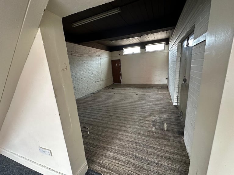 Shop/commercial property (+flat above separately)