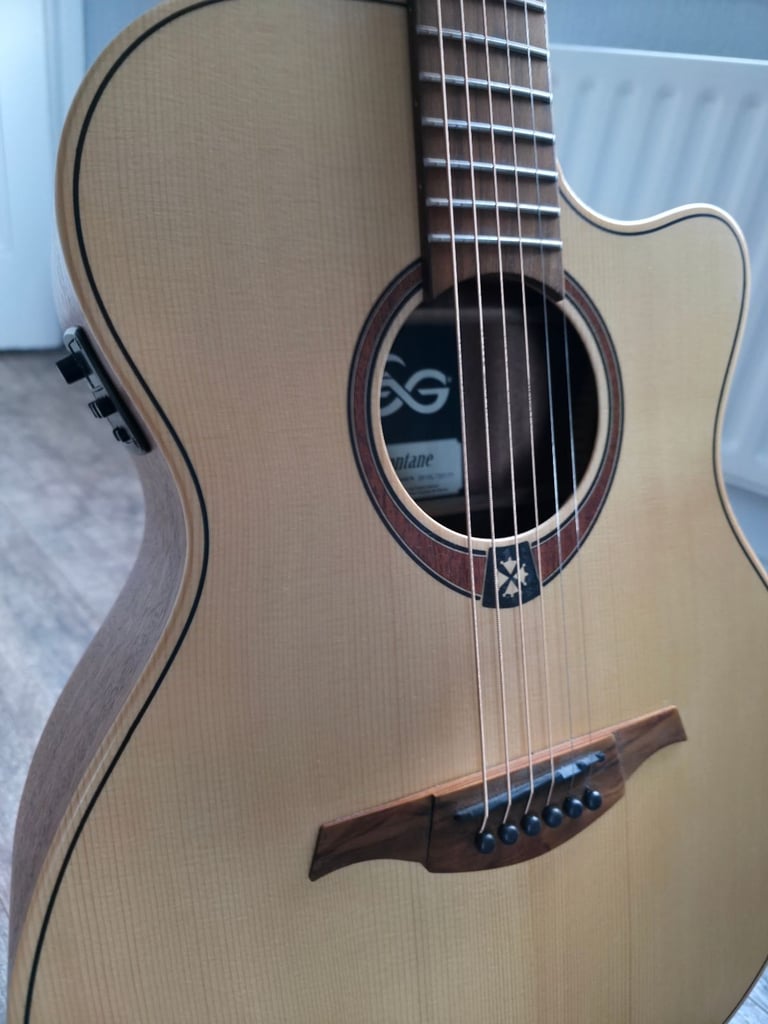 Electro Acoustic Guitar with stand, plectrums, capo included - Barely Used!